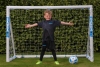 Family football game using SAMBA PLAY goal in back garden